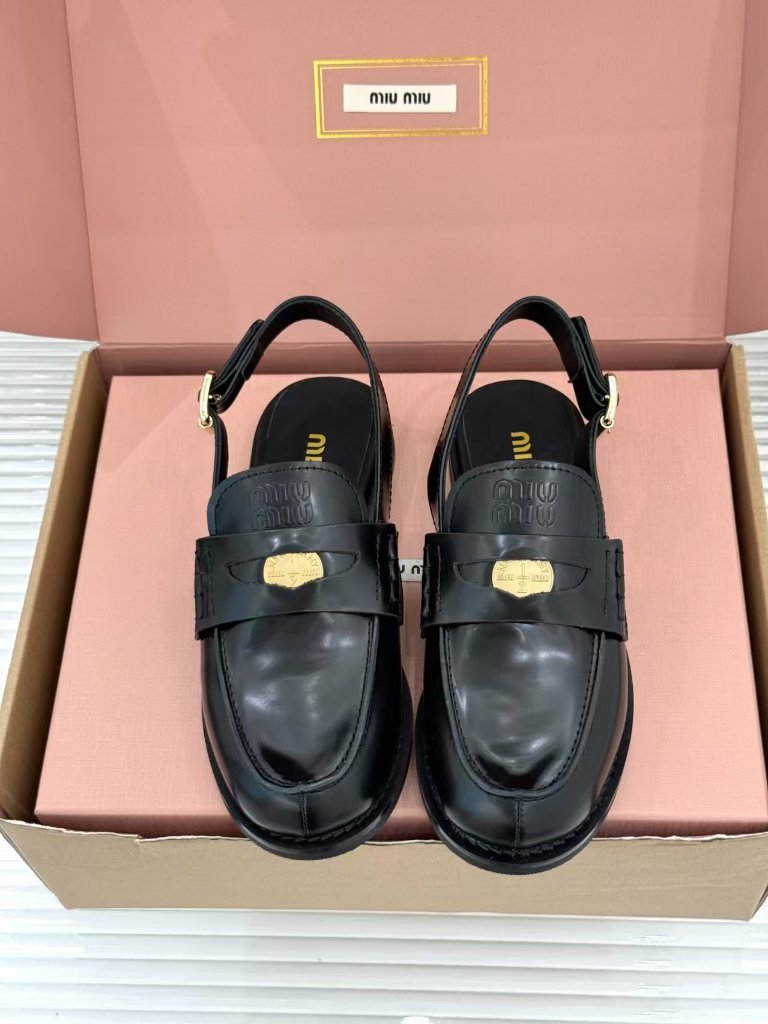 Miu Miu Black Leather Slingback Loafers Embossed Logo Gold Medallion Shoes